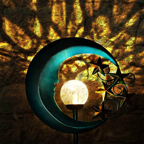Stars Moon Solar Lights Outdoor Garden Decor Crackle Glass Globe with stars and crescent moon design glowing at night