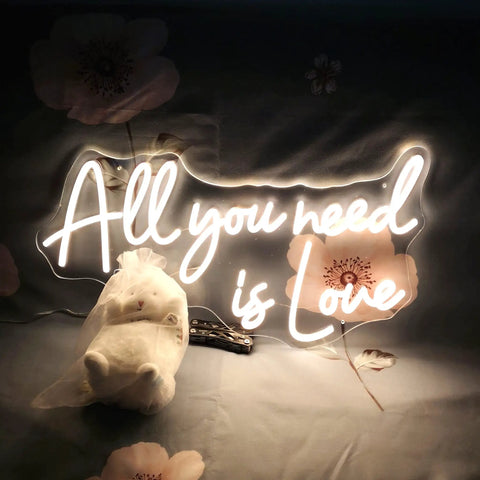 Love Neon Sign LED Neon Light For Wall Decor Warm White Glow with "All you need is Love" text on floral background, 22 x 11.9 inch