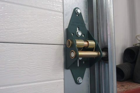 Energy Saving Garage Door Hinge For 12 Foot Wide And Over 5 Panel Doors With Self Adjusting Seal System installed on door