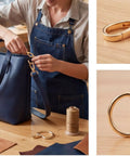 Top Shelf Swivel Snap Hooks Paired With D Rings And Easy Gliding Tri Glide Slides In Solid Antique Bronze Casting Measuring One Point Five Inches Wide A Five Piece Lot Ready To Roll For Leather Crafting And Bag Building in use with leather bag construction.