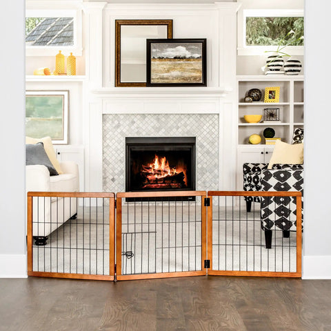 22 To 62 Inch Super Wide Dog Gate With Small Pet Door, Premium Wooden Three Panel Freestanding Gate in living room doorway