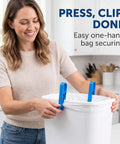 Lock Tight Plastic Garbage Bin Clips With Textured Anti Slip Grip Kick The Slipping Habit And Keep Kitchens Fresh Secure Trash Bag Holders 10 Pack Quick Setup, blue clips securing a white trash bag.
