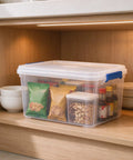 Heavy Duty 15 Quart Latching Storage Bin With Secure Lock Tight Lid And Crystal Clear Window For Real Deal Durability And Snug Fit All Purpose Organizing Setup holding pantry goods on a wooden shelf.
