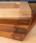 Four wooden profile samples stacked vertically labeled Shaker, Art Deco, Mission, Ogee for Interior And Exterior Door Shaper Cutter Set.