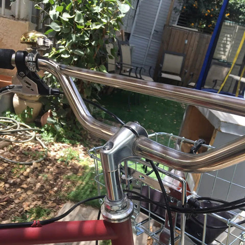 Close-up of road bike stem gooseneck for 25.4 and 22.2 mm handlebars aluminum head with iron body durable ride ready 220 mm