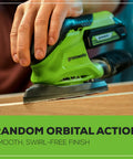 Cordless 24V Mouse Detail Sander With 11,000 OPM Orbit in use on wood surface, showing green sander with removable dust bag and battery