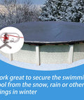 Easy To Install Pool Cover Cable And Winch Kit For Above Ground Pools, 100 Feet Of Heavy Duty Cable with a pool view in winter