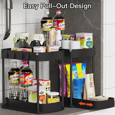 Heavy Duty Sliding Under Sink Organizers 2 Pack Black Pull Out Cabinet Drawers holding bottles and snacks in kitchen storage.