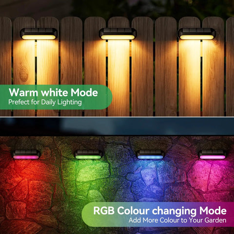 4 Pack Solar Outdoor Lights With RGB Color Changing And Warm White Modes illuminating a fence and wall in yard.