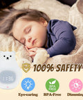 Cute Bear Night Light For Kids, Soft BPA-Free Silicone Nursery Lamp next to sleeping child, showing BPA-Free and dimming features.
