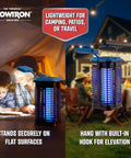 Two In One Solar Powered Bug Zapper With UV Light And LED Lamp, USB C Backup Charging, hanging on patio with family reading inside.