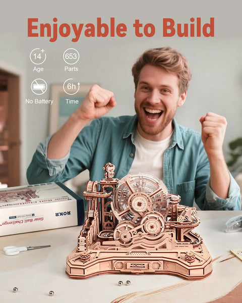 3D Wooden Puzzle And Marble Run Kit For Adults And Teens, Build And Play DIY Gear Ball Challenge With Auto Lift, Ramps And Victory Bell, Retro Gamepad Styled Model Building Toy For Christmas And Birthday Gifts. Wooden marble run kit, 653 pieces, built on table.