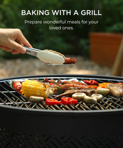 Person grilling vegetables and meat on a 26 Inch Fire Pit With Grill And Lid For Outdoor Use, Three In One Wood Burning Fire Pit Table With Poker.