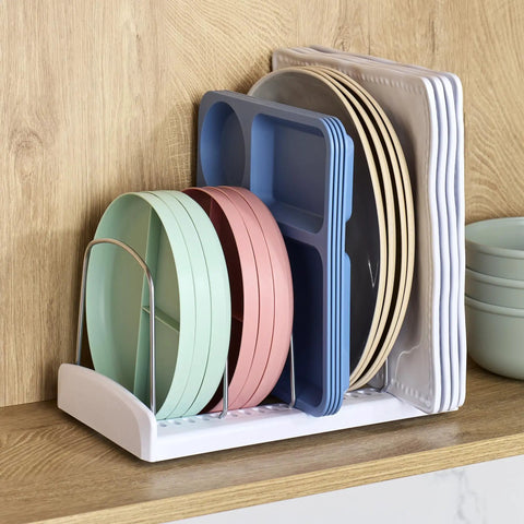 StoreMore Adjustable Bakeware Rack With Steel Wires Seven Adjustable Dividers organizing trays and pans on kitchen shelf.
