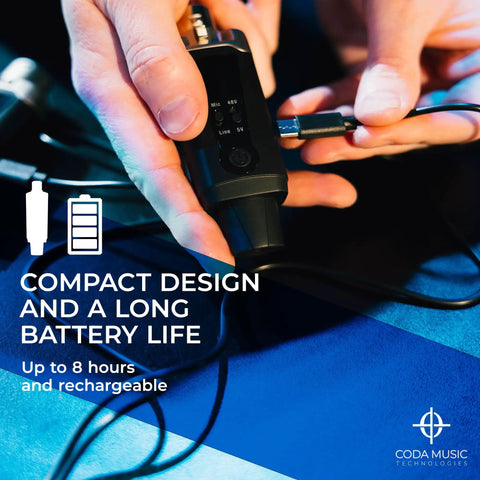 Close-up of Wireless XLR Transmitter And Receiver Kit showing USB-C charging cable being connected, emphasizing compact design.