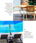 Beefy Mobile Umbrella Stand With Wheels And Locks Fillable Base holds 125 lbs, positioned by poolside and patio chairs.
