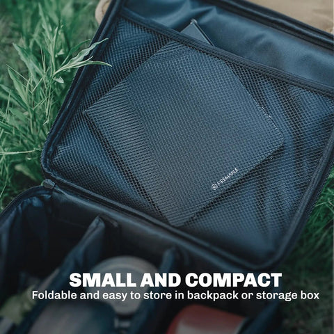 Featherweight Ultralight Folding Camp Table for Solo Camping and Backpacking folded in a black storage bag