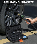 Side view of AstroAI tire pressure gauge with inflator and glow dial connected to car tire, with open tool case.