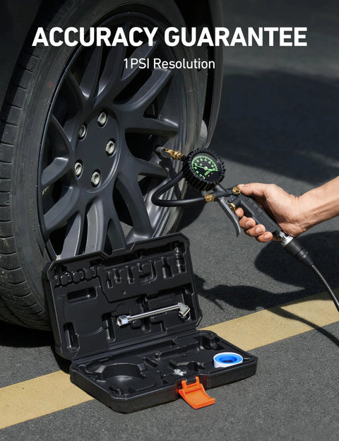 Side view of AstroAI tire pressure gauge with inflator and glow dial connected to car tire, with open tool case.