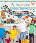 Children in front of Geography Bulletin Board Set Must Have Adventure Travel Map Classroom Decor With World Countries Flags.