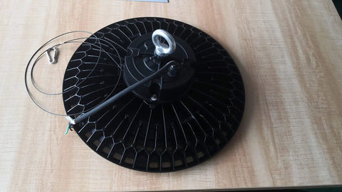 240W UFO LED High Bay Light 6500K Hella Bright For Warehouse Long Life 50000 Hour Die Cast Aluminum Fixture on table