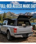 Lockable Truck Bed Cap For Dodge Ram 1500 2020 To 2026 With 6.4 Foot Bed shown with wide open lift doors for easy access.