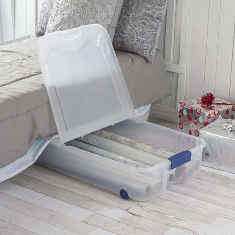 Open Two Pack 66 Quart Clear Underbed Storage Bins With Low Friction Wheels And Snap Tight Blue Latches showing gift wrap inside.