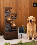 Five Tier Solar Outdoor Water Fountain With LED Lights 33 Point 5 Inch Tall Waterfall with solar panel in a patio