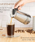 Pouring coffee from a Stovetop Espresso Maker 9 Cup Moka Pot In Stainless Steel 450ml 15oz Easy Brew For Camping Or Home Use Italian Style Coffee Percolator