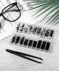 500 Piece Micro Screw Kit For Glasses And Electronics With Black Screws Included Screwdriver And Tweezers displayed on table