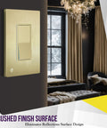 Elite Series Screwless Decorator Wall Plate In Brushed Gold 1 Gang 4.68 Inch H By 2.93 Inch L in modern room setting.