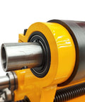 BREVELTION portable hole drilling machine with yellow housing, steel drive shaft and bearing housing, side view