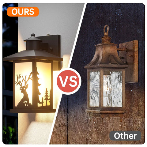 Comparison of two outdoor wall lantern designs, one with a decorative deer and trees, the other with a rustic finish.