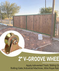 2-inch V-groove caster wheel mounted on a base-plate bracket; gold metal finish for sliding gates and track systems