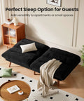 66 Inch Convertible Futon Sofa Bed With Corduroy Upholstery, black, reclined in living room setting, adjustable backrest and armrests.