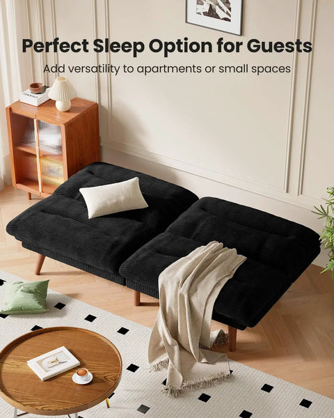 66 Inch Convertible Futon Sofa Bed With Corduroy Upholstery, black, reclined in living room setting, adjustable backrest and armrests.