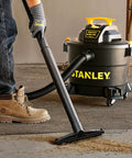 Person using Wet Dry Vacuum With 10 Gallon Tank, 4 HP Motor, 16 Ft Cleaning Reach, Workhorse Shop Vacuum on garage floor