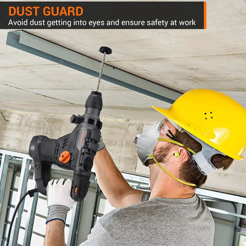 Worker using Heavy Duty SDS Plus Rotary Hammer Drill 1-1/4 Inch, 12.5 Amp on ceiling with dust guard feature shown