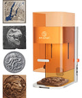 Dual Laser Engraver And Cutter With 20W Fiber Laser And 30W Diode Laser Beast Speed At 15000 Millimeters Per Second 0.001mm Engraving Precision 3D Engraving Machine For Jewelry Metal Wood shown engraving intricate designs on various materials.