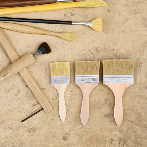 Wood Handle Paint Brush Set, 3 Pack Flat Stain Brushes For Furniture And Wood, Multi Size 2.5 Inch, 3 Inch, 4 Inch on beige surface