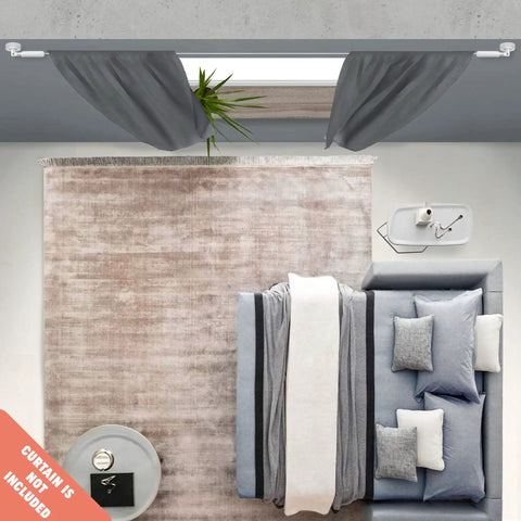 Wire Curtain Hanging System With 16Ft Stainless Steel Room Divider Rod And 24 Alligator Clips For Easy Breezy Draping over a living room.