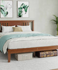 Heavy Duty Solid Pine Queen Platform Bed Frame With Stylish Headboard, showcasing thick slat support and a cozy bedding setup.