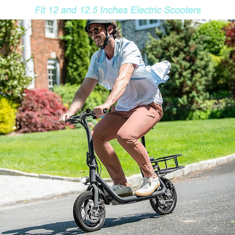 Person riding a scooter with 2 Pack 12.5x2.25 Inner Tubes For 12 And 12.5 Inch Electric Scooters And E Bike Replacement Tubes