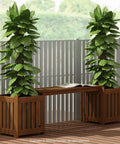 Two In One Planter Bench Set With Premium Hardwood Planters Outdoor Garden Bench For Patio Porch Balcony Or Backyard Two 15.8 Inch Square Boxes Connected By A 40.5 Inch Seat Create A Space Saving Versatile Floral Display, shown with lush green plants.