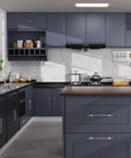 Modern kitchen with blue cabinets featuring Six Pack 3 Inch Clear Glass Cabinet Handles And Pulls For Dresser And Drawers Kitchen And Bathroom Brushed Nickel Crystal Knobs 76mm Mount Distance Includes Two Screw Sizes And L Wrench Tool installed on island drawers.