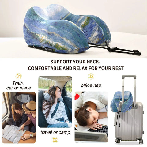 Monet's Sea Sailboat Travel Neck Pillow with memory foam on a table, ideal for planes, cars, or offices.