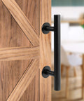 12 Inch Beefy Heavy Duty Sliding Barn Door Pull Handle Set With Two-Side Flush Design, Round Black Finish on wooden door