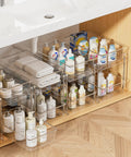 Pull Out Under Sink Organizer Set Of Four Slick Sliding Drawers Multi Purpose Cabinet Storage Tray For Bathroom Vanity Kitchen Pantry Countertop Cosmetic Holder Total Lifesaver, featuring clear bins with toiletries.
