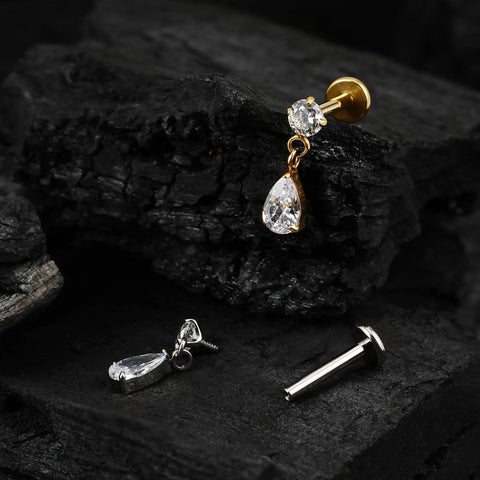 Top Shelf Titanium Cartilage Earring Flat Back Stud featuring interchangeable posts and dangle drop design on dark wood.