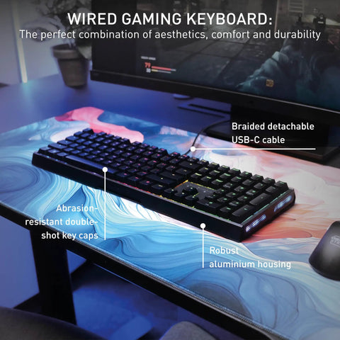 Wired gaming keyboard featuring rock solid aluminum chassis and ultra smooth MX2A brown switches on a colorful desk mat.